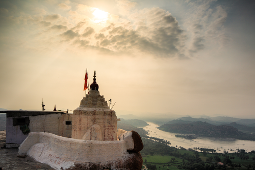 Hampi Tour: Serenity at Sanapur Lake with Breathtaking Boulders and Cliff Jumping from Bangalore